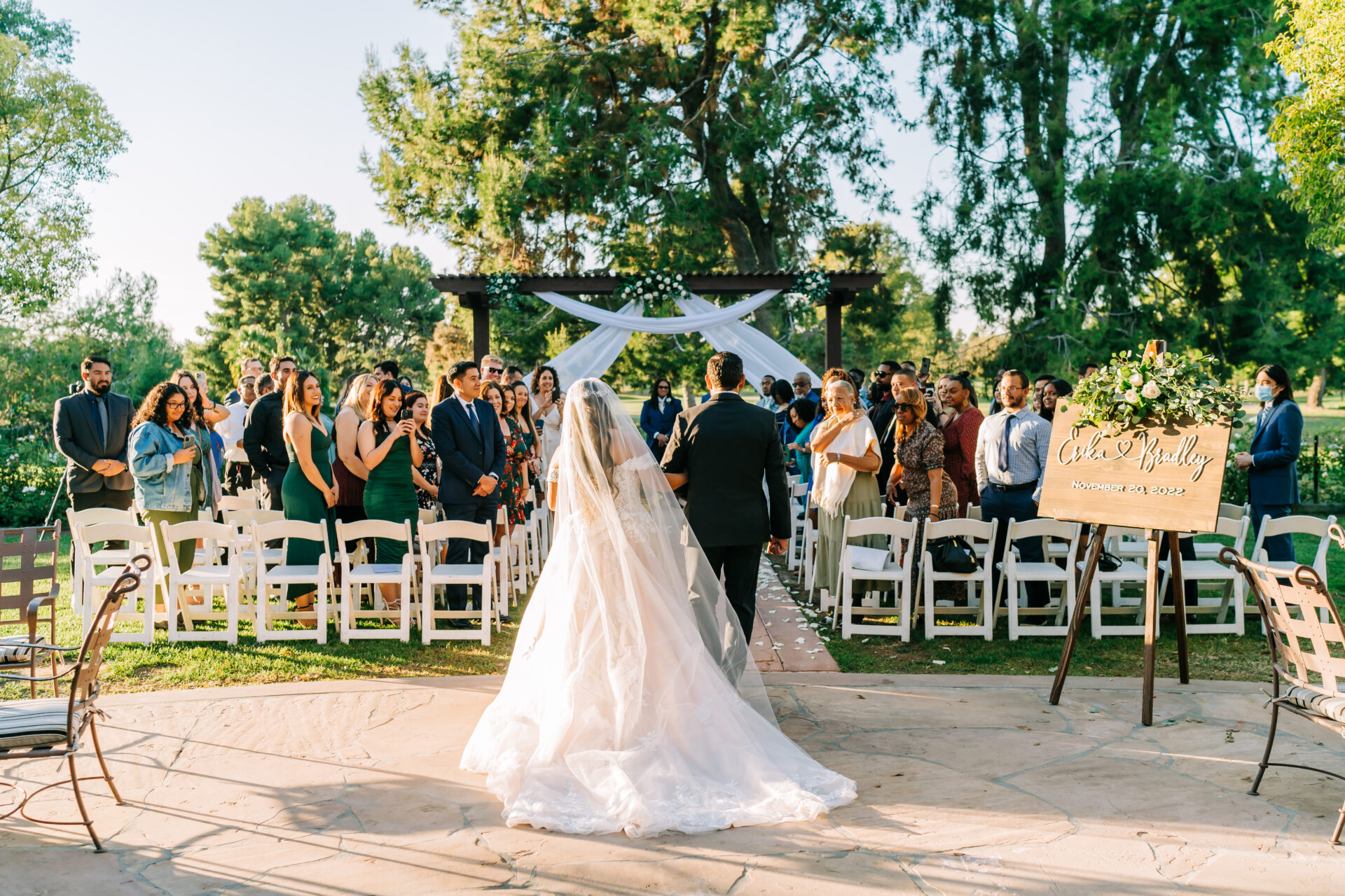 Bride walks down the aisle with her father